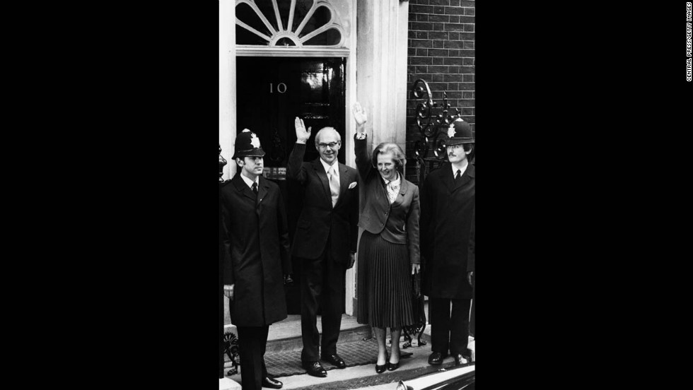Thatcher, becoming the first female prime minister of a European country, stands with her husband, Denis, outside 10 Downing Street in May 1979 after her party&#39;s success in the general election.