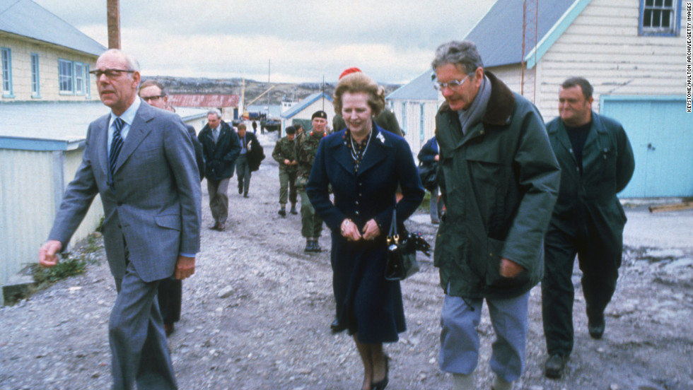 Thatcher and her husband, Denis, left, visit a school in the Falkland Islands in 1983.