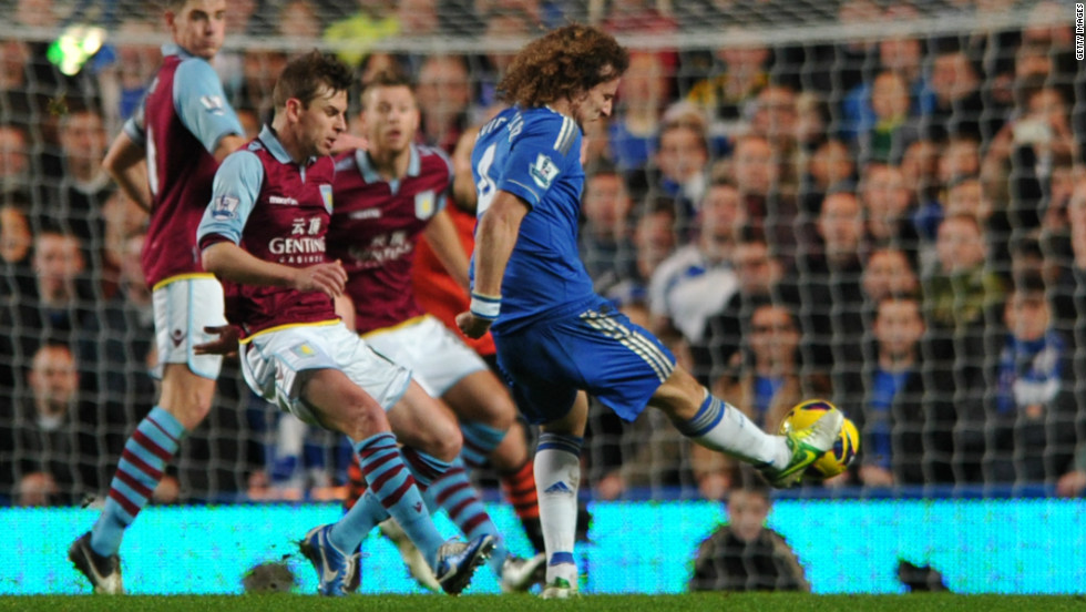 David Luiz doubled Chelsea&#39;s lead on 29 minutes with a spectacular free-kick as Chelsea cruised past a young Villa side at Stamford Bridge.