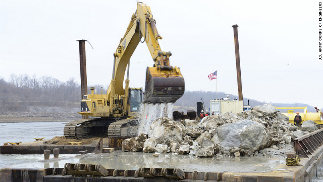 An excavator removes rocks from the bed of the Mississippi River near Thebes, Illinois. 