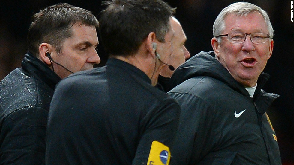 Alex Ferguson shouts at assistant referee Andy Garrett in scenes reminiscent of the midweek 4-3 win over Newcastle, after which the United manager was widely criticized for harrassing match officials.