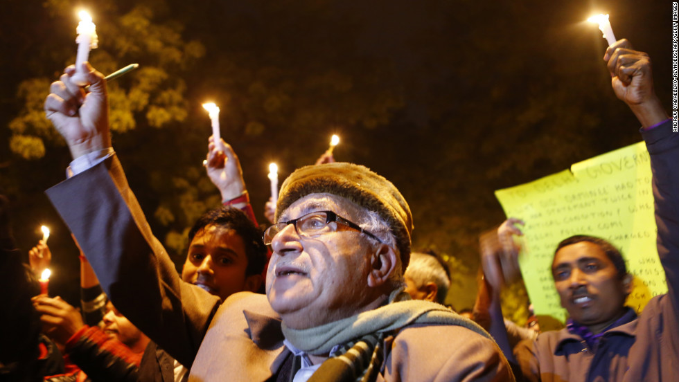 Indian protesters hold candles during a rally in New Delhi on Sunday, December 30, following the cremation of the gang-rape victim.