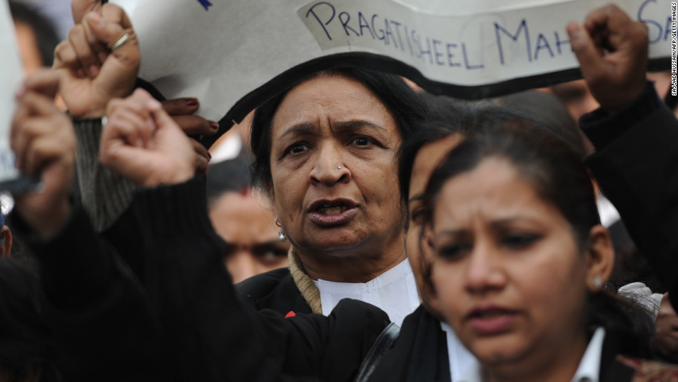 Indian lawyers shout during a protest at the entrance to Saket District Court in New Delhi on Thursday, January 3.