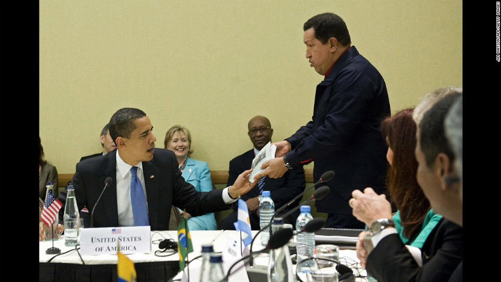 Chavez, right, gives a copy of the book, &quot;The Open Veins of Latin America&quot; by Eduardo Galeano to President Barack Obama during a multilateral meeting at the Summit of the Americas in Port of Spain, Trinidad, on April 18, 2009.