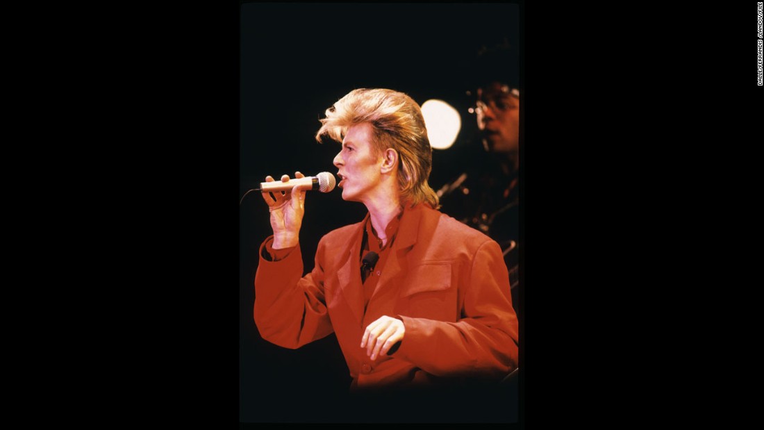 Bowie performs sporting a blond mullet in 1987.