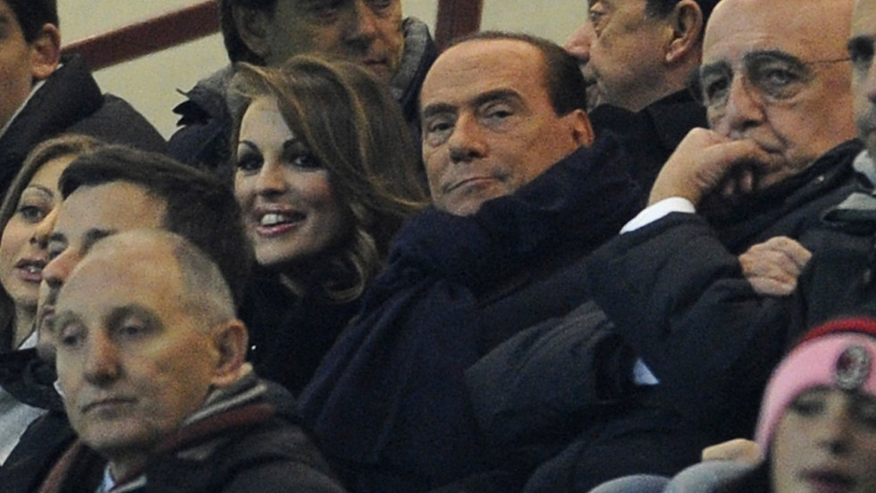 &quot;Berlusconi is an opportunist, who will say anything to win short-term support,&quot; Italian historian John Foot -- the author of the authoritative book on Italian football &quot;Calcio&quot; -- told CNN, in reference to the AC Milan owner&#39;s support for Boateng after the player walked off the pitch. &quot;His comments are hypocritical at best, especially given his alliance with anti-immigrant and far-right parties, and his comments on Barack Obama (he called him &#39;sun-tanned&#39;),&quot; added Foot. Berlusconi is pictured in the center, wearing a scarf.