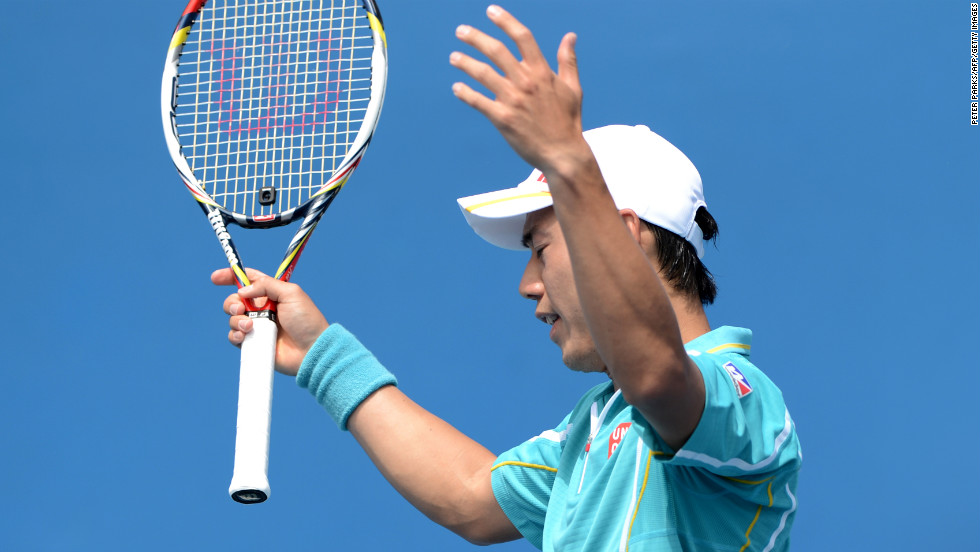 Japan&#39;s Kei Nishikori gestures after playing a stroke to Romania&#39;s Victor Hanescu during their men&#39;s singles match on January 14. Kei won 6-7(5) 6-3 6-1 6-3.