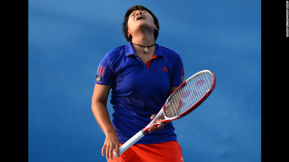 Thailand&#39;s Luksika Kumkhum reacts after a point against Hungary&#39;s Timea Babos during their women&#39;s singles first-round match on January 15. Kumkhum defeated Babos 7-6(5), 6-4.