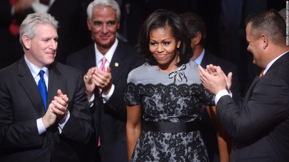 At the final 2012 presidential debate in Boca Raton, Florida, Obama donned the same Thom Browne fog-gray dress with black lace overlay that she had worn at the Democratic National Convention, reworked this time with a black belt and a stone brooch, Taylor noted.