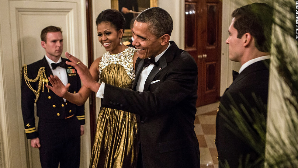 Obama greeted the audience at the Kennedy Center Honors in December 2012 in a striking gold lamé gown by Michael Kors, fashion consultant Mikki Taylor noted.