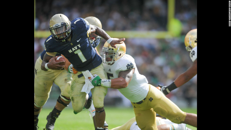 Te&#39;o tackles Trey Miller of Navy during their game in Dublin, Ireland, on September 1, 2012.