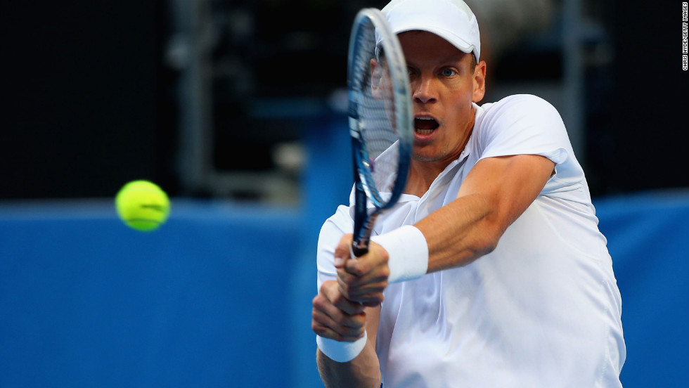 Tomas Berdych of the Czech Republic plays a backhand in his third round match against Jurgen Melzer of Austria on January 18. Berdych won 6-3, 6-2, 6-2.