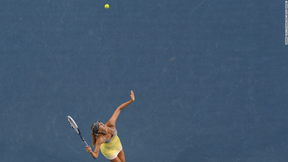 Sharapova serves against Williams during their women&#39;s singles match on January 18.