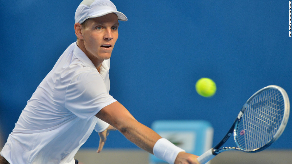 Berdych plays a return during his men&#39;s singles match against Melzer on January 18.
