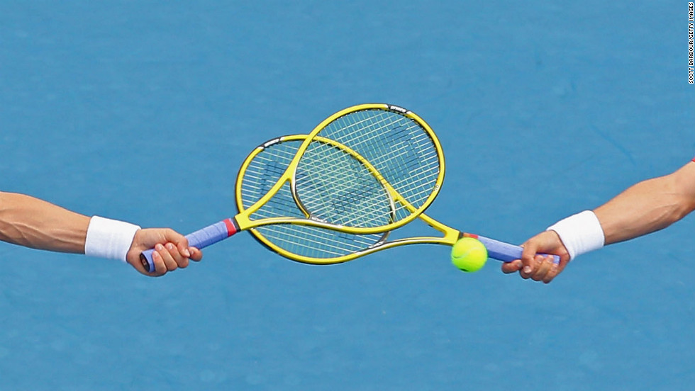 The racquets of Bob Bryan of the United States and Mike Bryan of the United States cross as they compete in their men&#39;s second round doubles match against Flavio Cipolla of Italy and Andreas Seppi of Italy on Friday, January 18. The Bryan brothers won 6-3, 6-4.