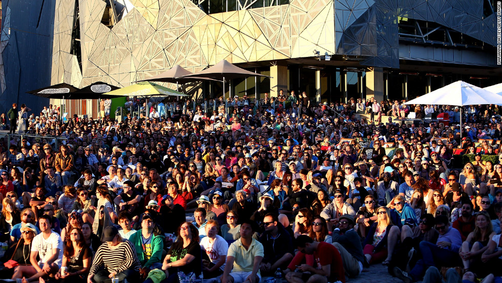 Huge crowds gather at Federation Square to watch Bernard Tomic of Australia play Roger Federer of Switzerland on Saturday, January 19. Federer won 6-4, 7-6 (5), 6-1.