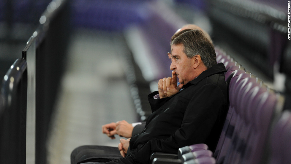 In April 2012, Mbemba was sent back to the Congo, but by August 2012 he was back at Anderlecht when he was given a three-year professional contract. Anderlecht&#39;s general manager Herman van Holsbeeck is pictured here sitting in the club&#39;s stadium watching a first-team training session.