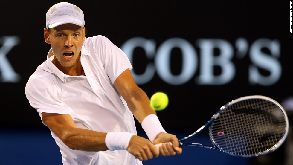 Berdych plays a backhand in his match against Djokovic on January 22.