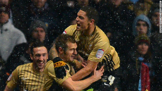 Bradford celebrates its equalizer during the 1-1 draw at Villa Park.