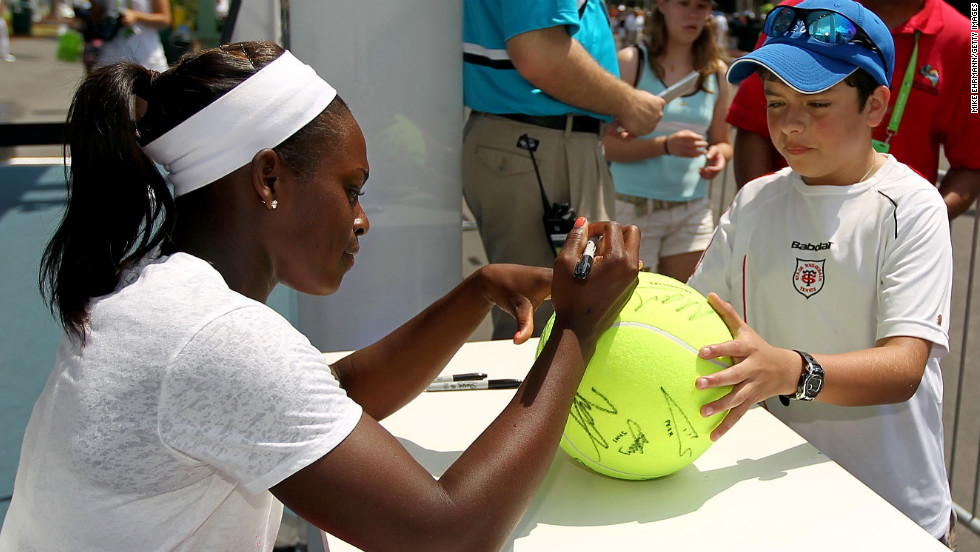 At the Sony Ericsson Open in 2011, Stephens signs an autograph for a young fan.