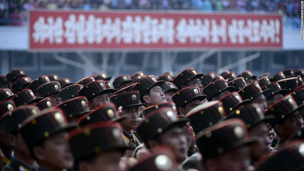 North Korean soldiers listen to a speech during an official ceremony attended by leader Kim Jong Un at a stadium in Pyongyang in April 2012.