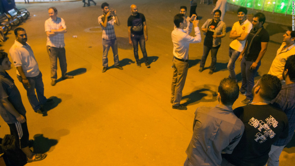 Fikra Space members experiment with Google Maps in a Baghdad park.
