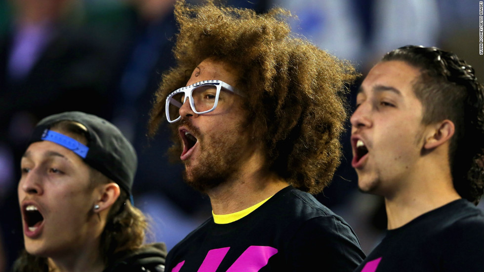 But Azarenka did have some support -- her boyfriend Stefan &quot;Redfoo&quot; Gordy (center), the son of Motown Records founder Berry Gordy and a pop star in his own right as a member of the band LMFAO.