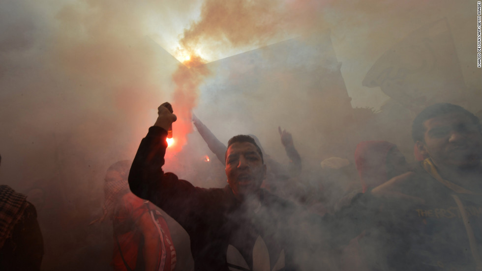 Egyptian fans of Al-Ahly football club rally outside the club&#39;s headquarters in Cairo on January 26.