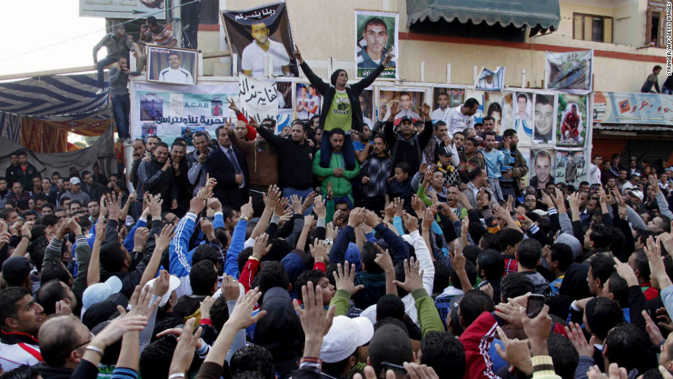 Protesters and fans of Al-Masry football club take part in a demonstration in front of the prison in Port Said.