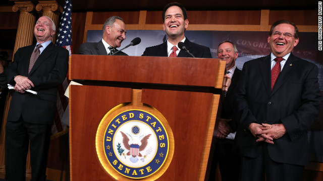 Sen. John McCain (R-AZ), Sen. Charles Schumer (D-NY), Sen. Marco Rubio (R-FL), Senate Majority Whip Sen. Richard Durbin (D-IL), and Sen. Robert Menendez (D-NJ) share a moment during a news conference on a comprehensive immigration reform framework Monday.