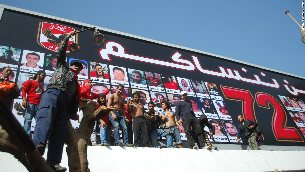 Some 15,000 fans of Al Ahly, many members of the club&#39;s Ahlawy ultras group, gathered in front of a billboard displaying pictures of the dead at the team&#39;s training ground to hear the verdict.