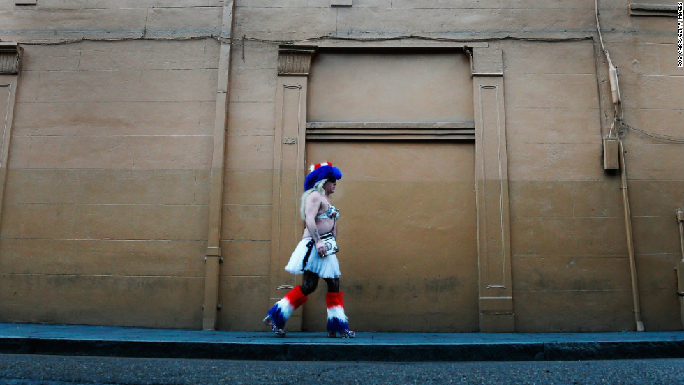 A man walks down the street in the French Quarter on January 28.