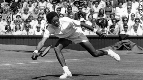 American tennis star Arthur Ashe in action against El Shafei on the centre court at Wimbledon during the men&#39;s singles.
