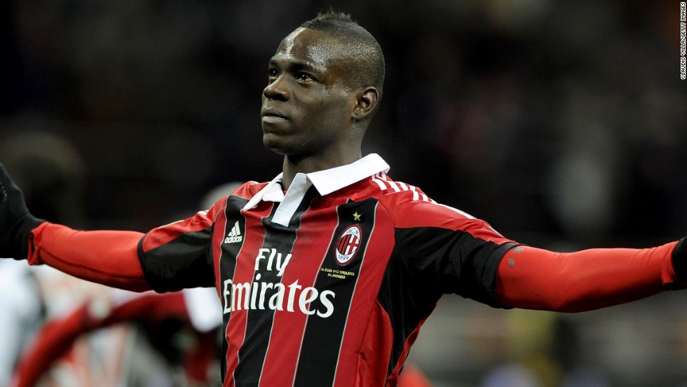 Mario Balotelli marked his return to Italy&#39;s Serie A with both goals in AC Milan&#39;s 2-1 win over Udinese, the second coming from the penalty spot deep into time added on.  