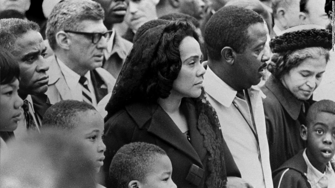 Parks, far right, joins a march through Memphis, Tennessee, on April 8, 1968 -- four days after the death of the Rev. Martin Luther King Jr. King organized the Montgomery bus boycott. His widow, Coretta Scott King, is seen at center next to the Rev. Ralph Abernathy.