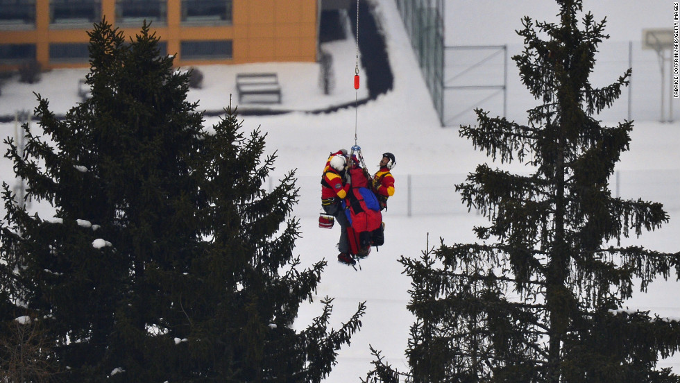 Vonn is lifted by a helicopter during the women&#39;s super-G event during the Alpine FIS Ski World Championships on Tuesday, February 5, 2013, in Schladming, Austria. 