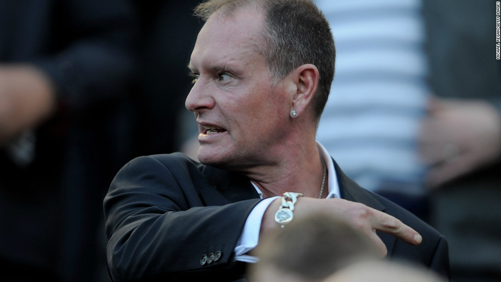 Gascoigne gestures as he watches a match between his former sides Newcastle and Tottenham at St James&#39; Park.