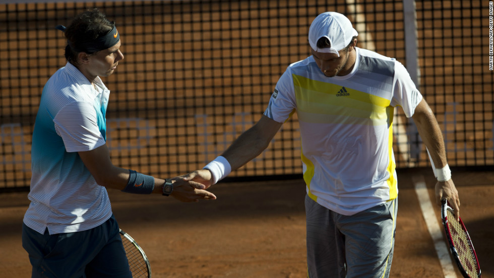 Nadal teamed up with his friend Juan Monaco to win their doubles match against Czech Republic&#39;s Frantisek Cermank and Lukas Dlouhy in a Chilean claycourt event.