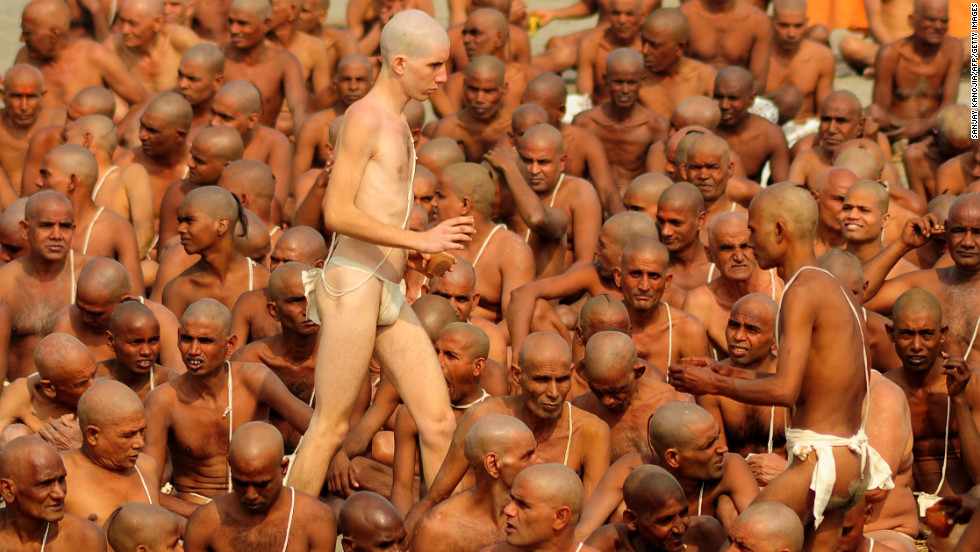 Naga Sadhus perform rituals on the bank of the Ganges River on January 30.