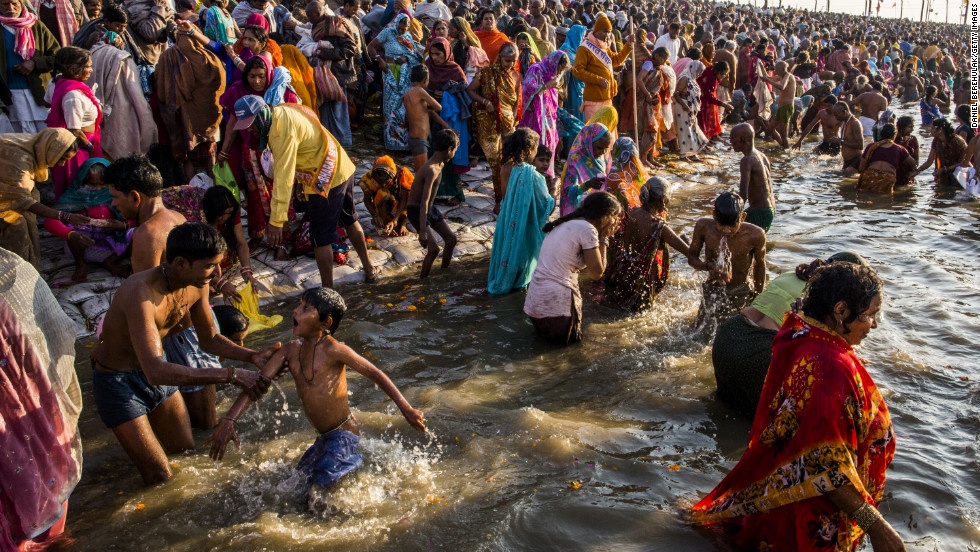 Hindu devotees bathe on the banks of the Sangam on February 9.