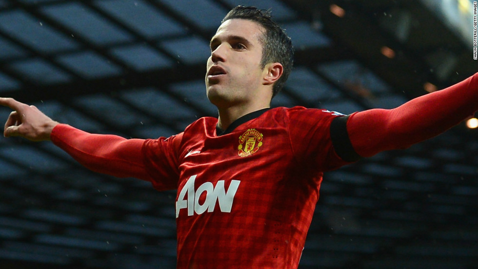 Robin van Persie celebrates after scoring Manchester United&#39;s second goal in the 2-0 win at home to Everton, which put his team 12 points clear in the English Premier League.