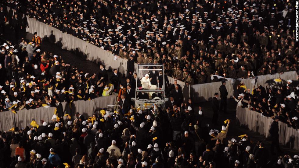 Benedict blesses pilgrims as he arrives in St. Peter&#39;s Square in his popemobile in March 2010 to meet with young people from Rome and the Lazio region in preparation for World Youth Day.