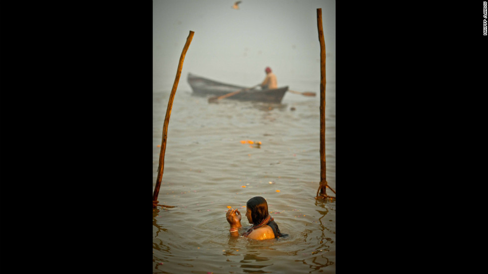 A woman bathes in the Sangam on February 17.