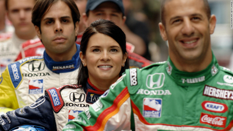 From left: Vitor Meira, Patrick and Tony Kanaan pose for a photograph in 2005 in Times Square.