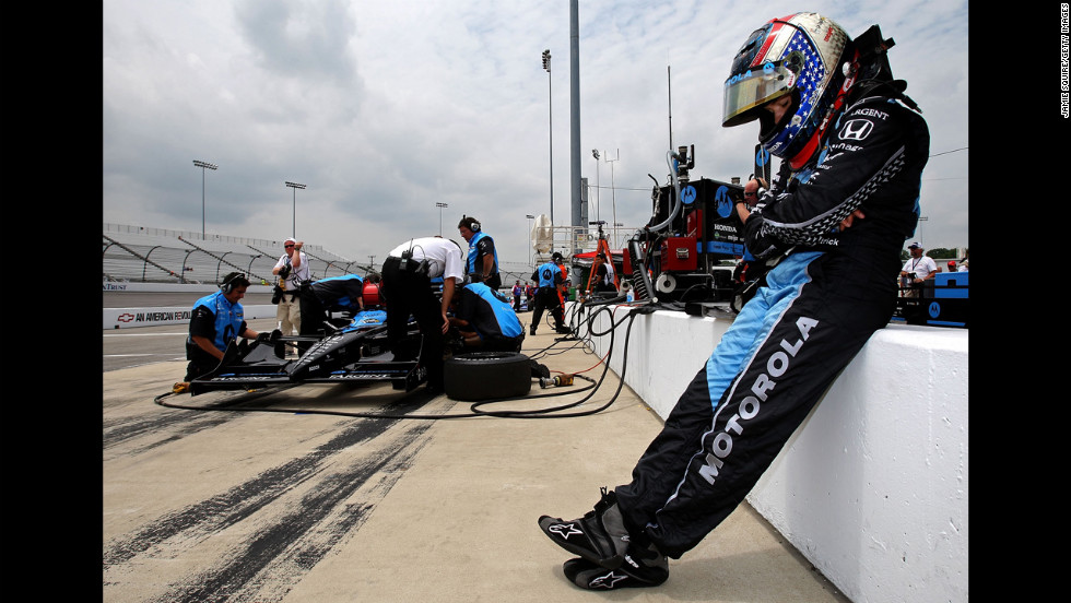 Patrick waits to get in her car during practice for the SunTrust Indy Challenge in 2007 in Richmond, Virginia.