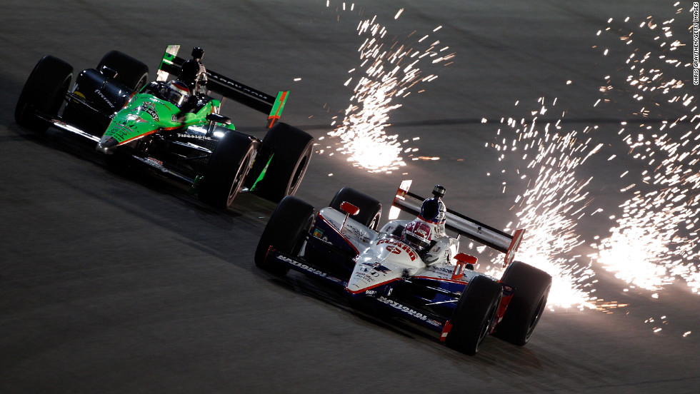 Patrick, left, drives next to Dan Wheldon during practice for the Cafes do Brasil Indy 300 in 2010 in Homestead, Florida. &lt;a href=&quot;http://www.cnn.com/2011/10/16/us/indycar-crash&quot;&gt;(Wheldon died in 2011 at the Las Vegas Indy 300).&lt;/a&gt;