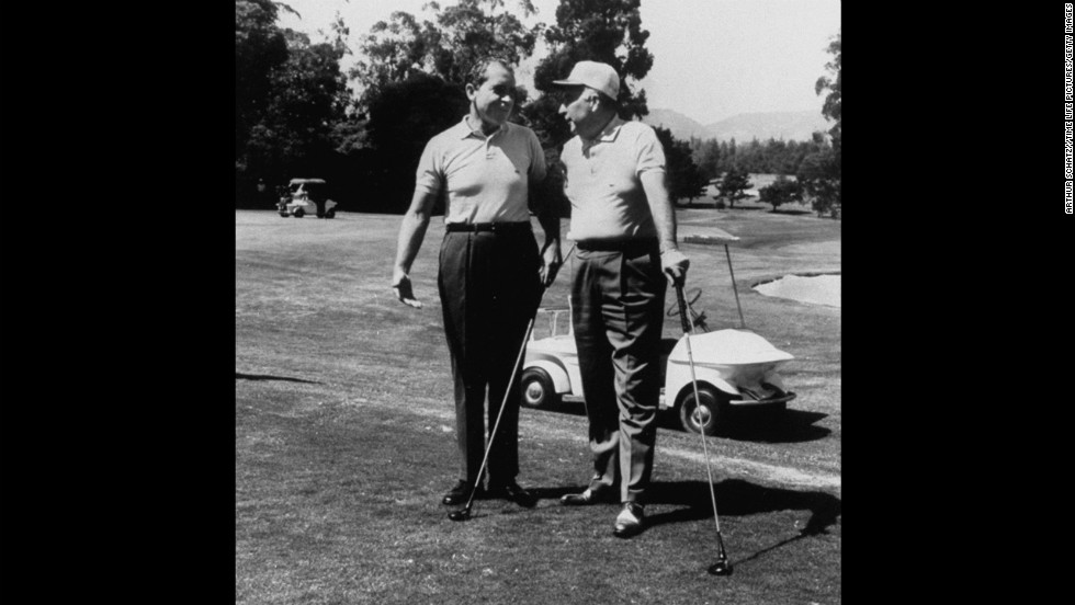 President Richard Nixon and Attorney General John Mitchell play golf at the Los Angeles Country Club in 1969.