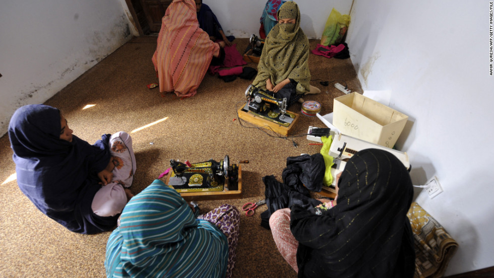 This photograph taken on February 28, 2011, shows women sitting at a vocational training center for women in a shelter set up by Mukhtar Mai to protect women in the village of Mirwala in Pakistan&#39;s central Punjab province. 