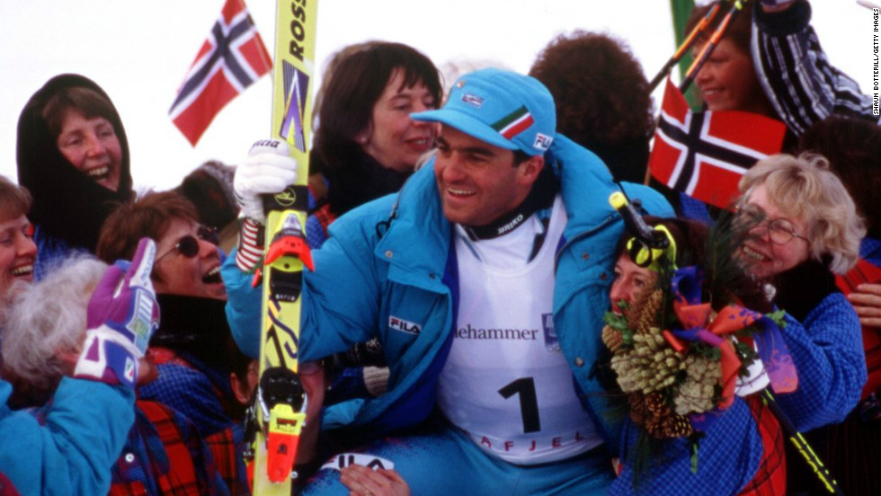 Tomba is mobbed by adoring fans after a sensational second leg saw him claim the slalom silver medal at the 1994 Winter Olympics in Lillehammer, Norway.