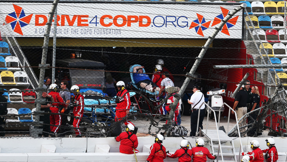 Injuries as debris flies into Daytona stands during fiery NASCAR crash